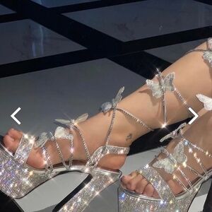 POSTER GIRL SILVER PLATFORM PIXIE HEELS